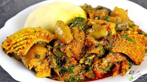 Vegetable soup, swallow with chicken 